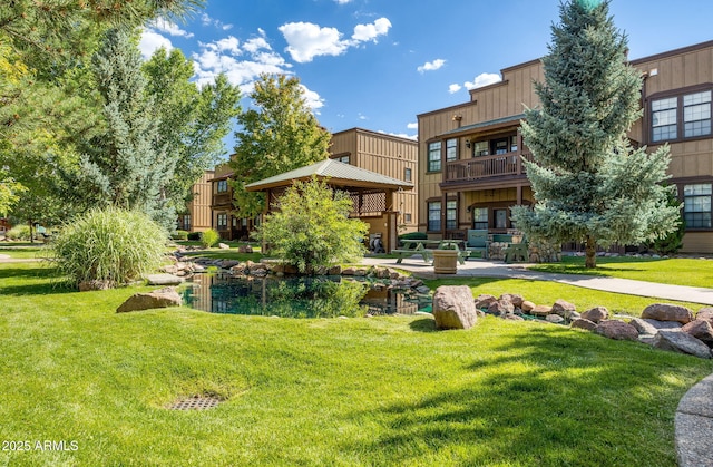 surrounding community featuring a lawn