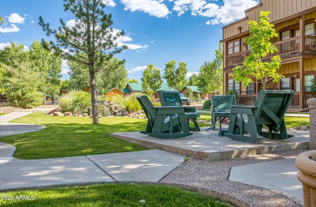 surrounding community with a lawn