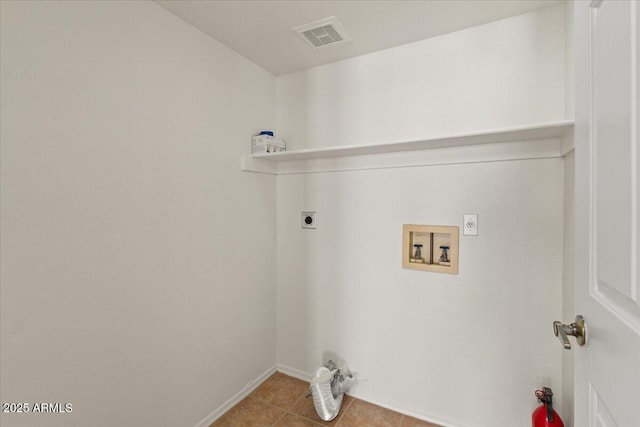 washroom featuring laundry area, hookup for a washing machine, electric dryer hookup, visible vents, and baseboards