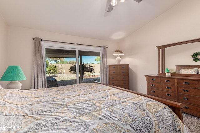 carpeted bedroom featuring ceiling fan, access to exterior, and vaulted ceiling