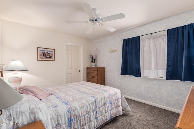 bedroom featuring ceiling fan and carpet floors