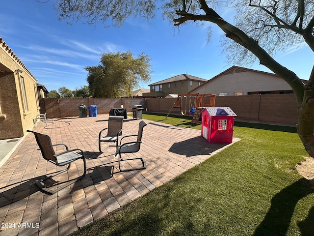 view of patio featuring a playground