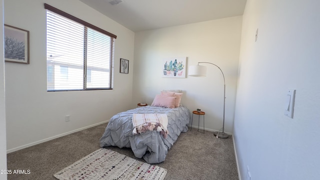 bedroom with light colored carpet