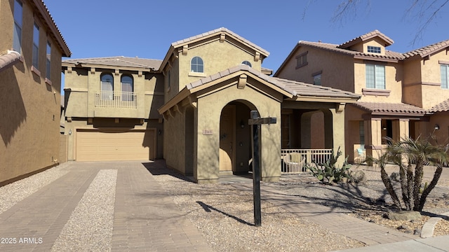 view of front of property with a garage