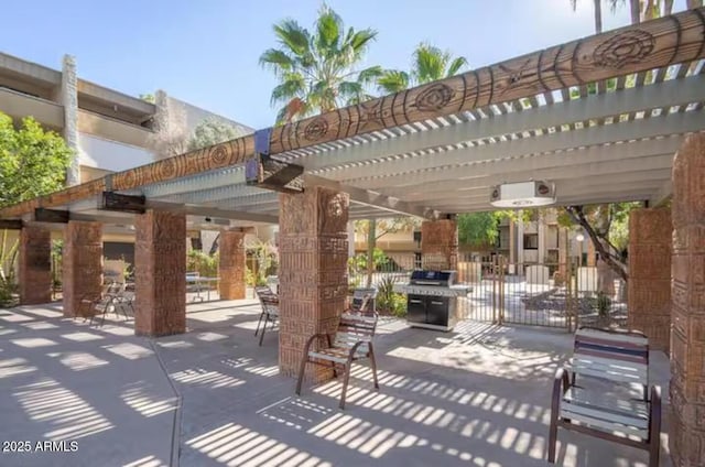 7625 E Camelback Rd Unit 310B, Scottsdale, AZ 85251 - view of patio with a pergola and a grill