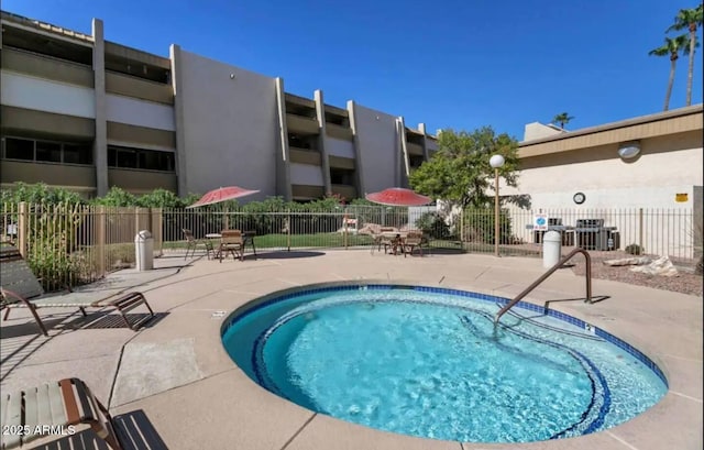 7625 E Camelback Rd Unit 310B, Scottsdale, AZ 85251 - view of swimming pool with a patio and fence