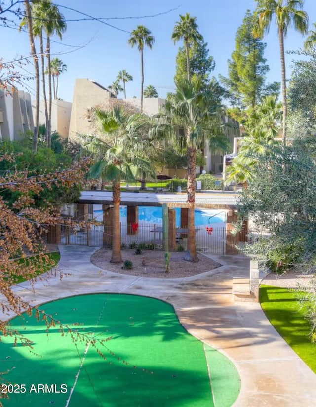 7625 E Camelback Rd Unit 310B, Scottsdale, AZ 85251 - view of community with fence and a putting area