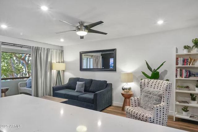 7625 E Camelback Rd Unit 310B, Scottsdale, AZ 85251 - living area with wood finished floors, ceiling fan, recessed lighting, and baseboards
