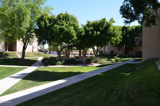 view of community featuring a gazebo and a lawn