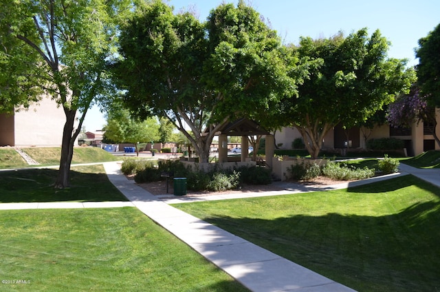 view of property's community featuring a gazebo and a yard