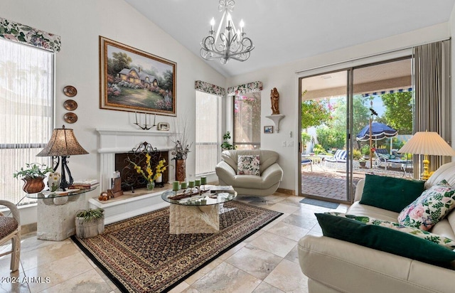 living room with lofted ceiling and a chandelier