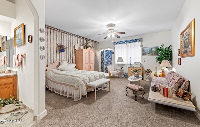 bedroom featuring ceiling fan and carpet flooring