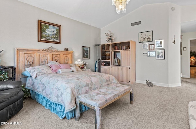 bedroom with a notable chandelier, lofted ceiling, and carpet flooring