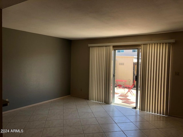 view of tiled spare room