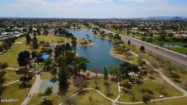 birds eye view of property featuring a water and mountain view