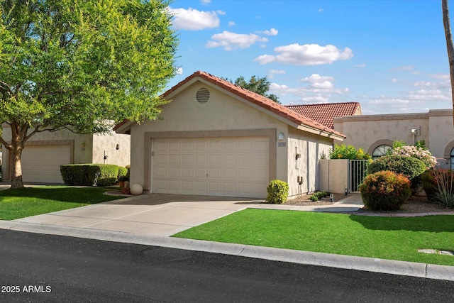 18780 N 94th Ave, Peoria, AZ 85382 - view of front facade with stucco siding, an attached garage, driveway, and a front lawn