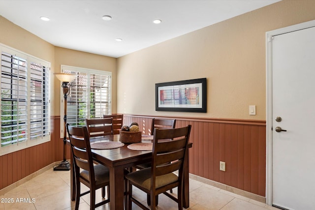 18780 N 94th Ave, Peoria, AZ 85382 - dining room with a wainscoted wall, light tile patterned flooring, recessed lighting, and wood walls