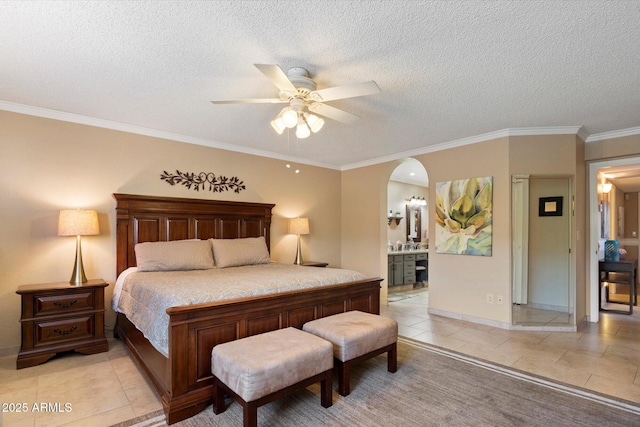 18780 N 94th Ave, Peoria, AZ 85382 - bedroom featuring light tile patterned floors, a textured ceiling, ensuite bath, arched walkways, and ornamental molding