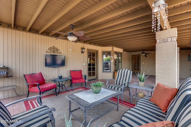 view of patio / terrace with an outdoor living space and ceiling fan