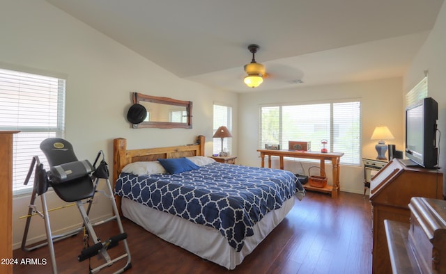 bedroom featuring ceiling fan, lofted ceiling, and dark hardwood / wood-style flooring