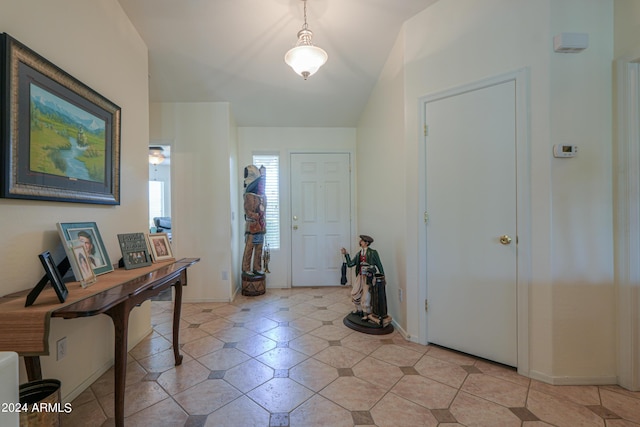 entryway with vaulted ceiling