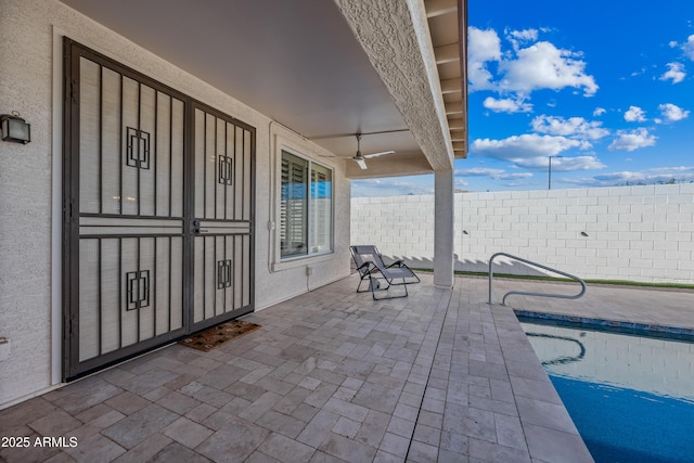 view of patio with a fenced in pool and a fenced backyard