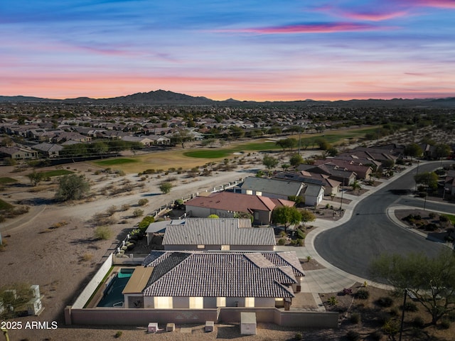 aerial view at dusk with a mountain view