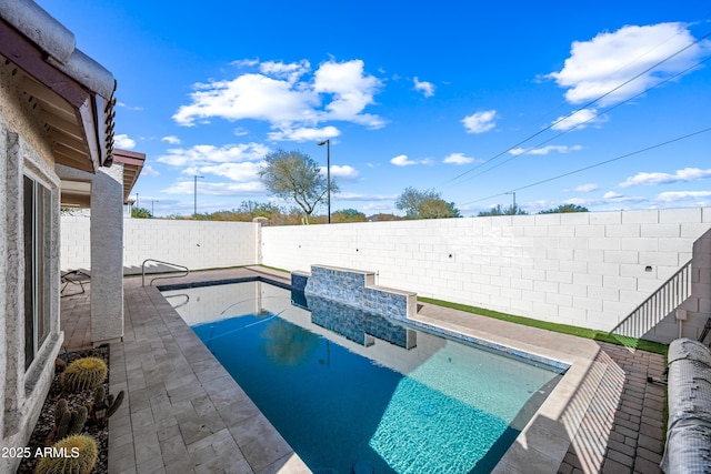 view of pool featuring a patio, a fenced backyard, and a fenced in pool