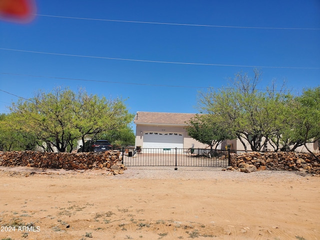 view of yard with a garage