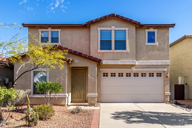 view of front of property with a garage