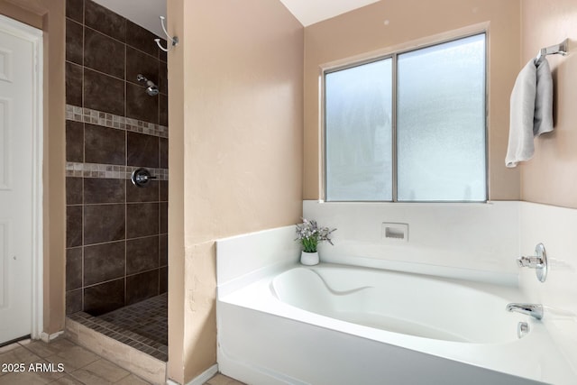 bathroom with plus walk in shower and tile patterned floors