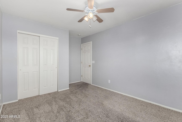 unfurnished bedroom with a closet, ceiling fan, and carpet flooring