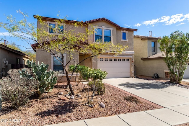 view of front of home with a garage