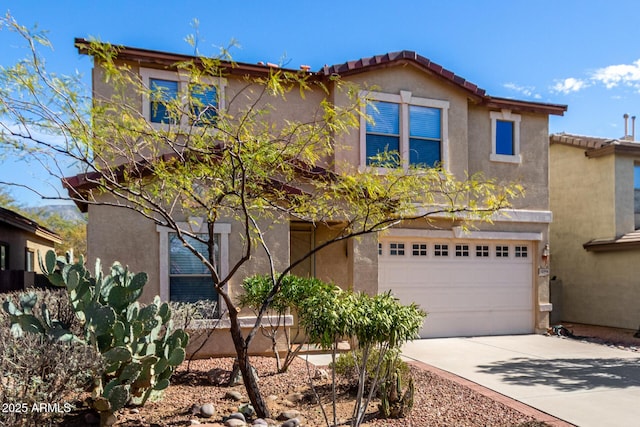 view of front of home with a garage