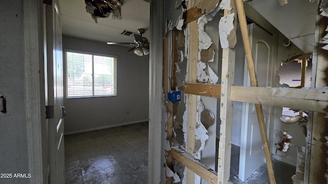 interior space featuring baseboards and visible vents
