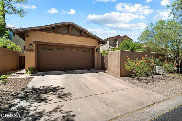 9262 E Desert Park Dr, Scottsdale, AZ 85255 - view of front of house featuring stucco siding, driveway, and an attached garage