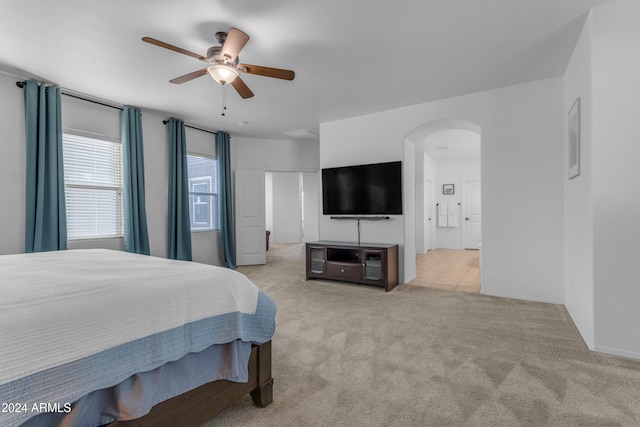 carpeted bedroom featuring ceiling fan