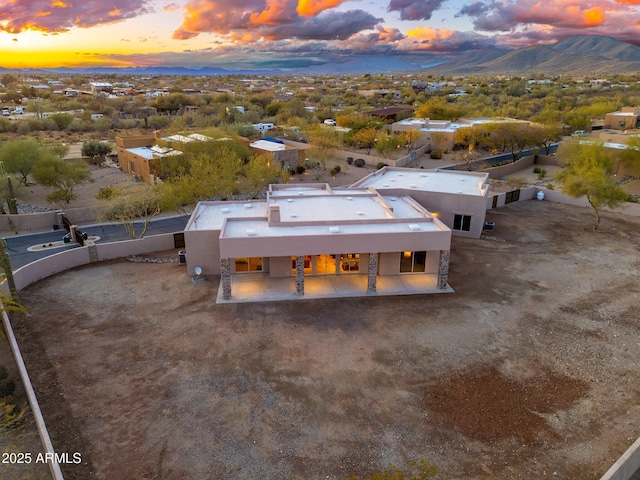 drone / aerial view featuring a mountain view