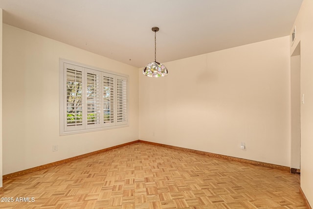 unfurnished room featuring light parquet floors