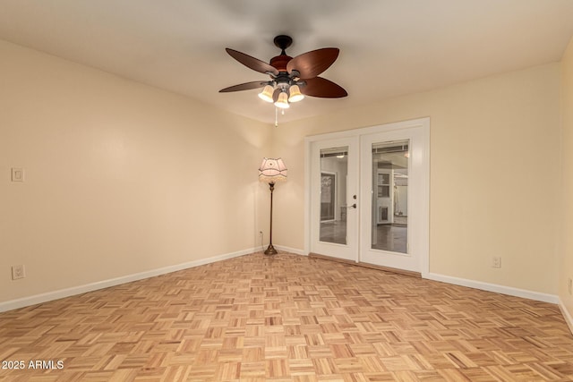 unfurnished room featuring french doors, light parquet floors, and ceiling fan