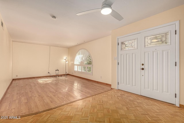 entrance foyer featuring ceiling fan and light wood-type flooring