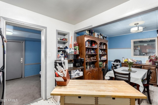 2801 W Glenrosa Ave, Phoenix, AZ 85017 - dining room featuring light carpet and built in shelves