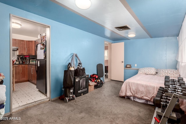 2801 W Glenrosa Ave, Phoenix, AZ 85017 - bedroom featuring freestanding refrigerator and light colored carpet