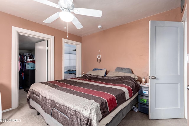 2801 W Glenrosa Ave, Phoenix, AZ 85017 - bedroom featuring carpet flooring, a spacious closet, and a ceiling fan