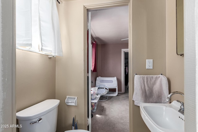 2801 W Glenrosa Ave, Phoenix, AZ 85017 - half bath featuring a sink and toilet