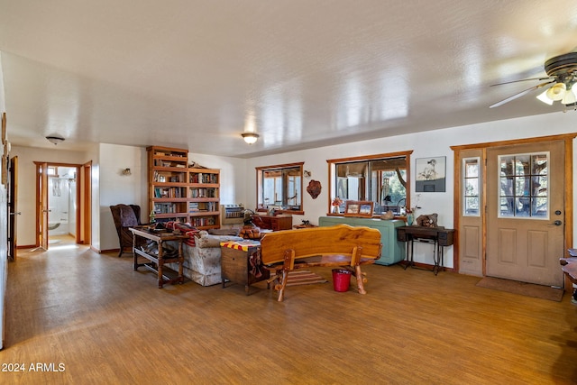 1528 Black Canyon Rd, Heber, AZ 85928 - living area featuring wood finished floors and ceiling fan
