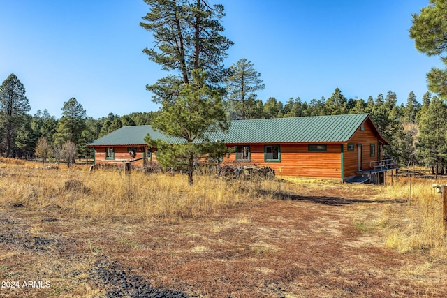 1528 Black Canyon Rd, Heber, AZ 85928 - back of property with metal roof and a wooded view