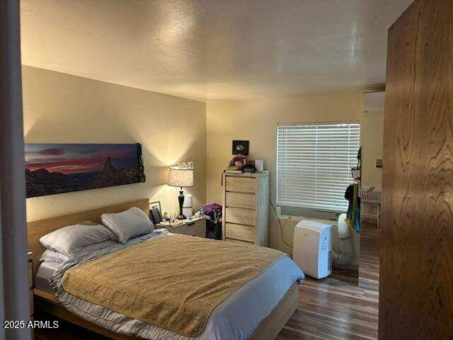 319 E Coronado Rd Unit 1, Phoenix, AZ 85004 - bedroom with wood finished floors