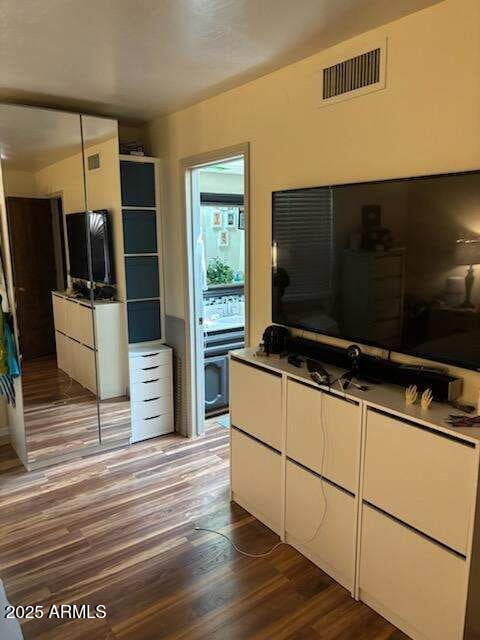 319 E Coronado Rd Unit 1, Phoenix, AZ 85004 - living room featuring wood finished floors