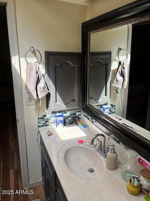 319 E Coronado Rd Unit 1, Phoenix, AZ 85004 - bathroom with vanity and wood finished floors